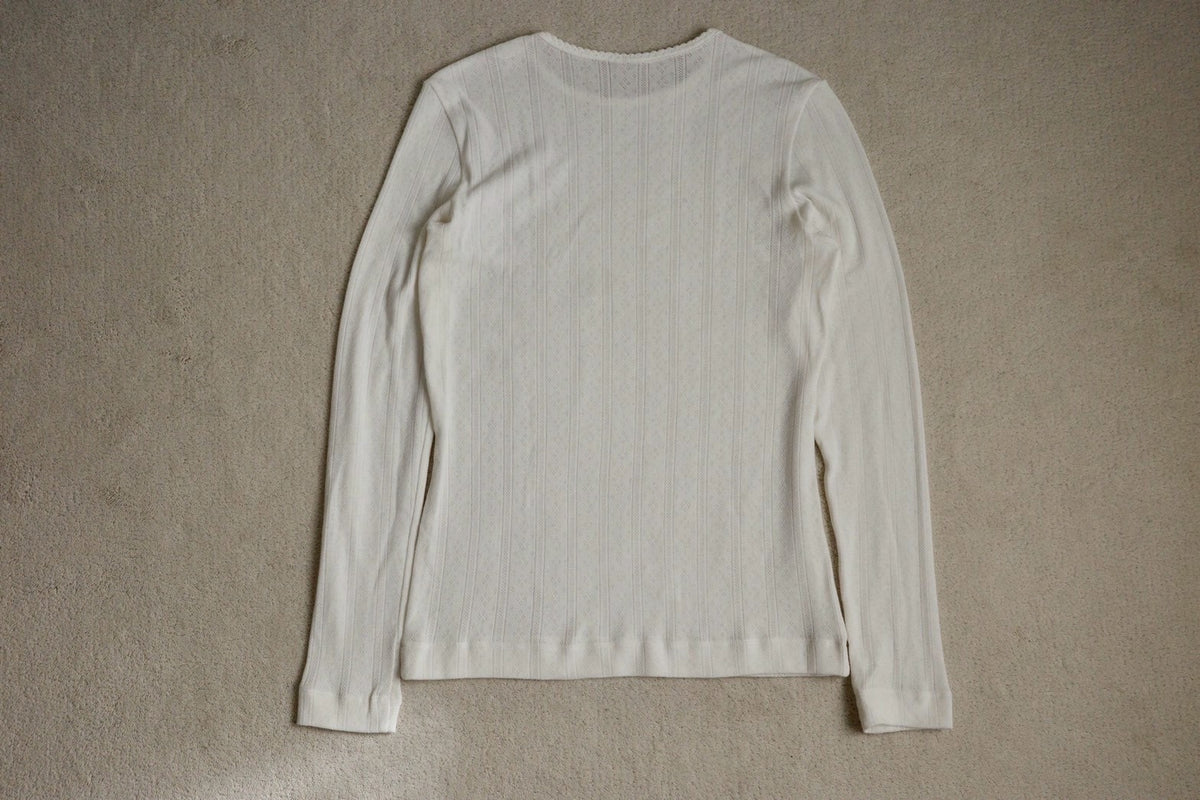 Eyelet long sleeve top