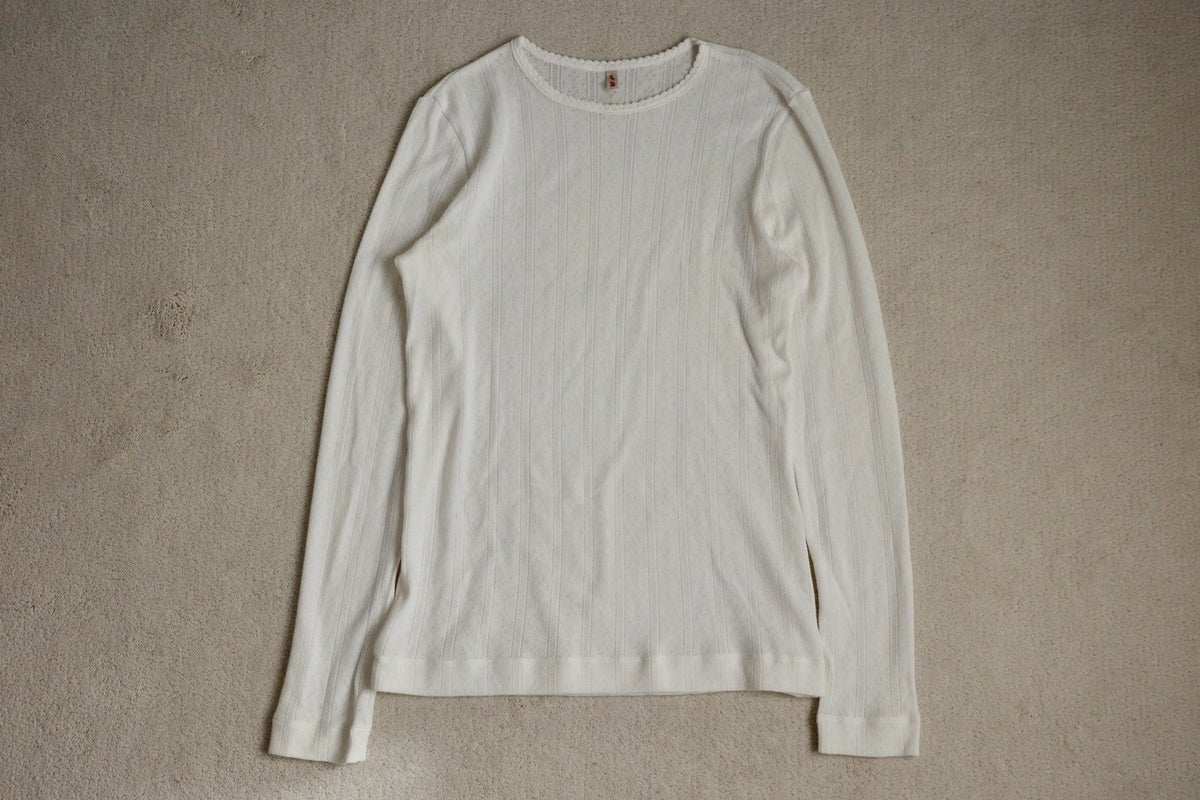 Eyelet long sleeve top